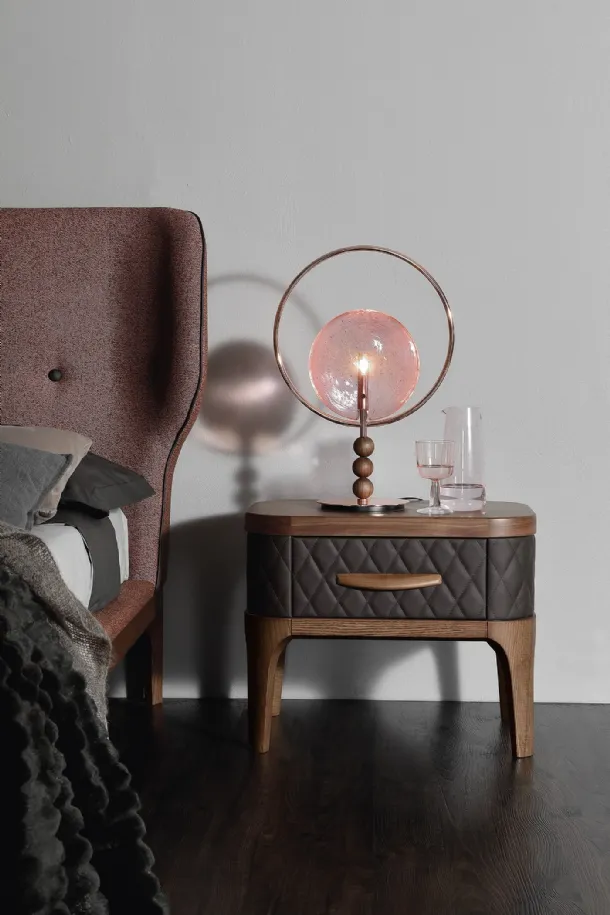 Wooden bedside table with quilted diamond-patterned Tiffany leather covering by Tonin Casa.