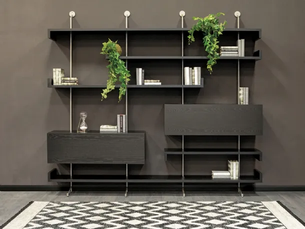 Wooden wall library with metal uprights Plan by Tonin Casa.
