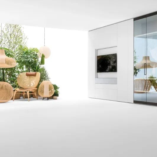 Living wall unit with glass doors by Caccaro.