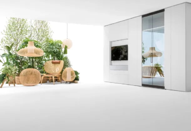 Living wall unit with glass doors by Caccaro.