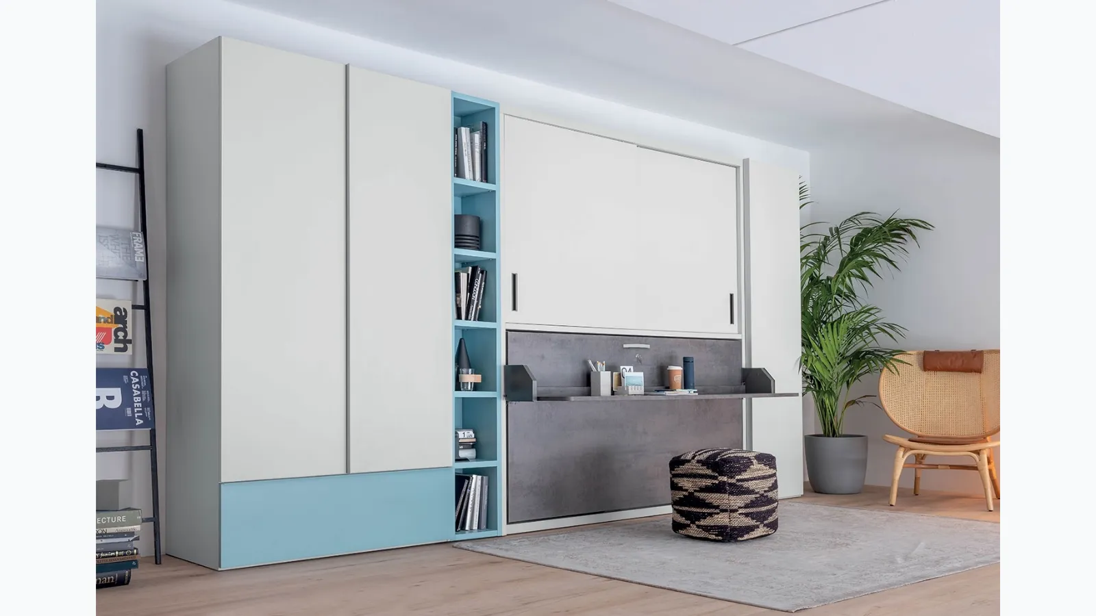 Single pull-out bed closed with integrated desk in matte lacquer Hiro wardrobe by Clever.