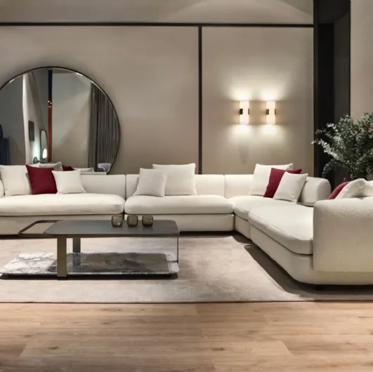 Gabrielle's corner sofa upholstered in Cantori fabric.