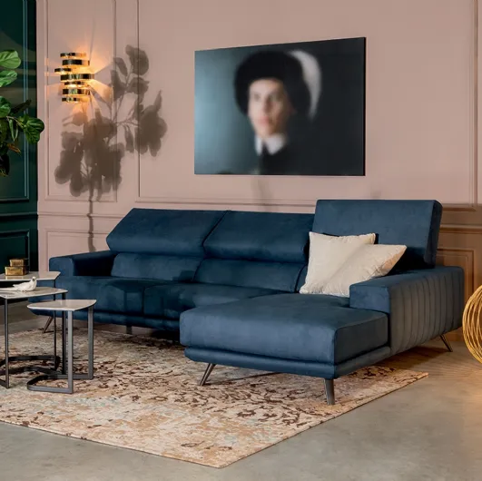 Leather sofa with chaise, reclining backrest and headrest Sebastian by Tonin Casa.