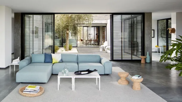 Fabric sofa with Soft Modular peninsula by Vitra.