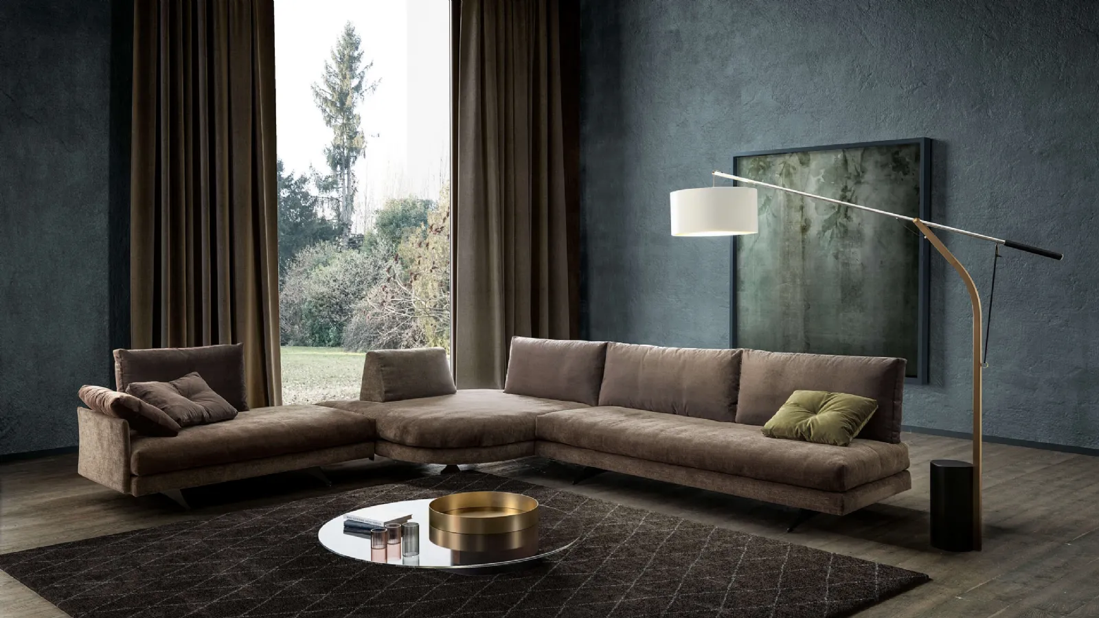 Corner sofa in Valentini's Stone fabric.