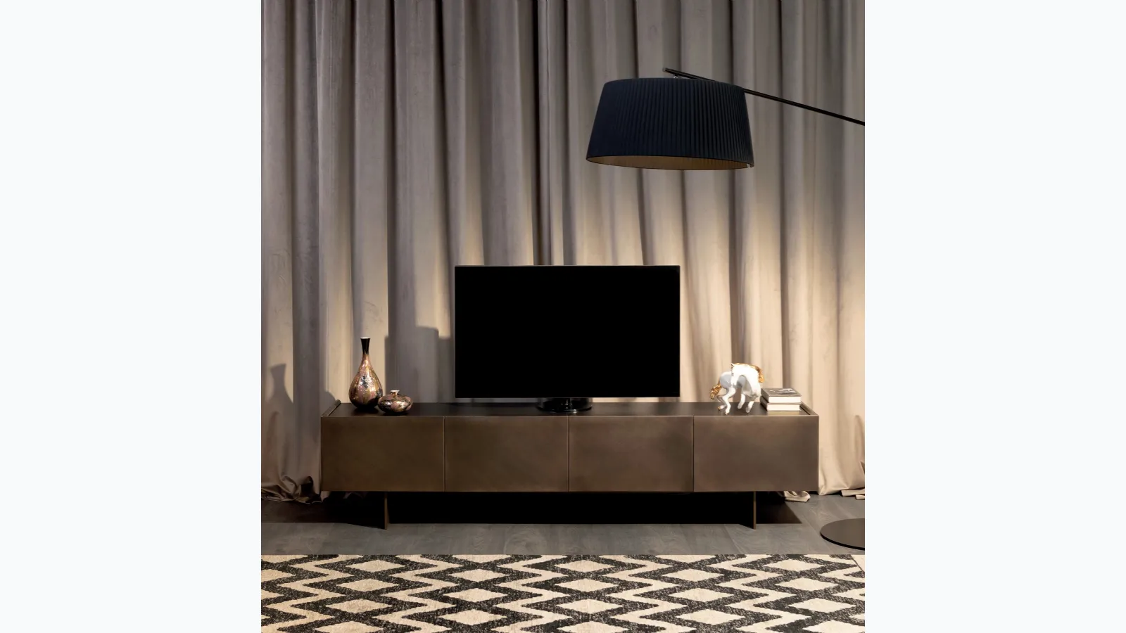 Madia Coated in brushed bronze lacquer by Tonin Casa.