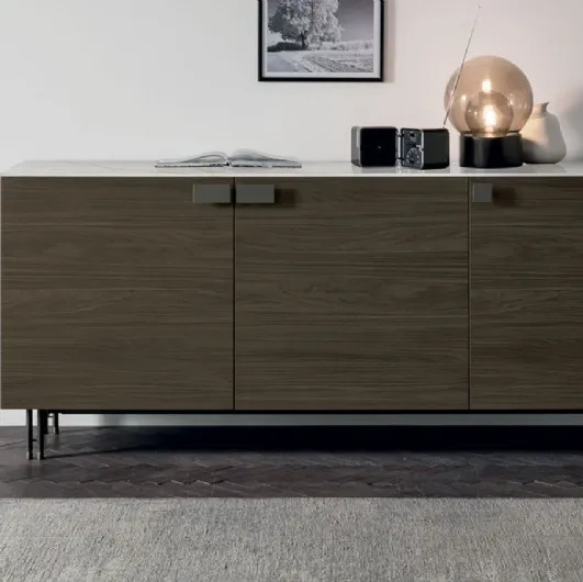 Prometheus sideboard in moka oak and top in Tomasella stoneware.