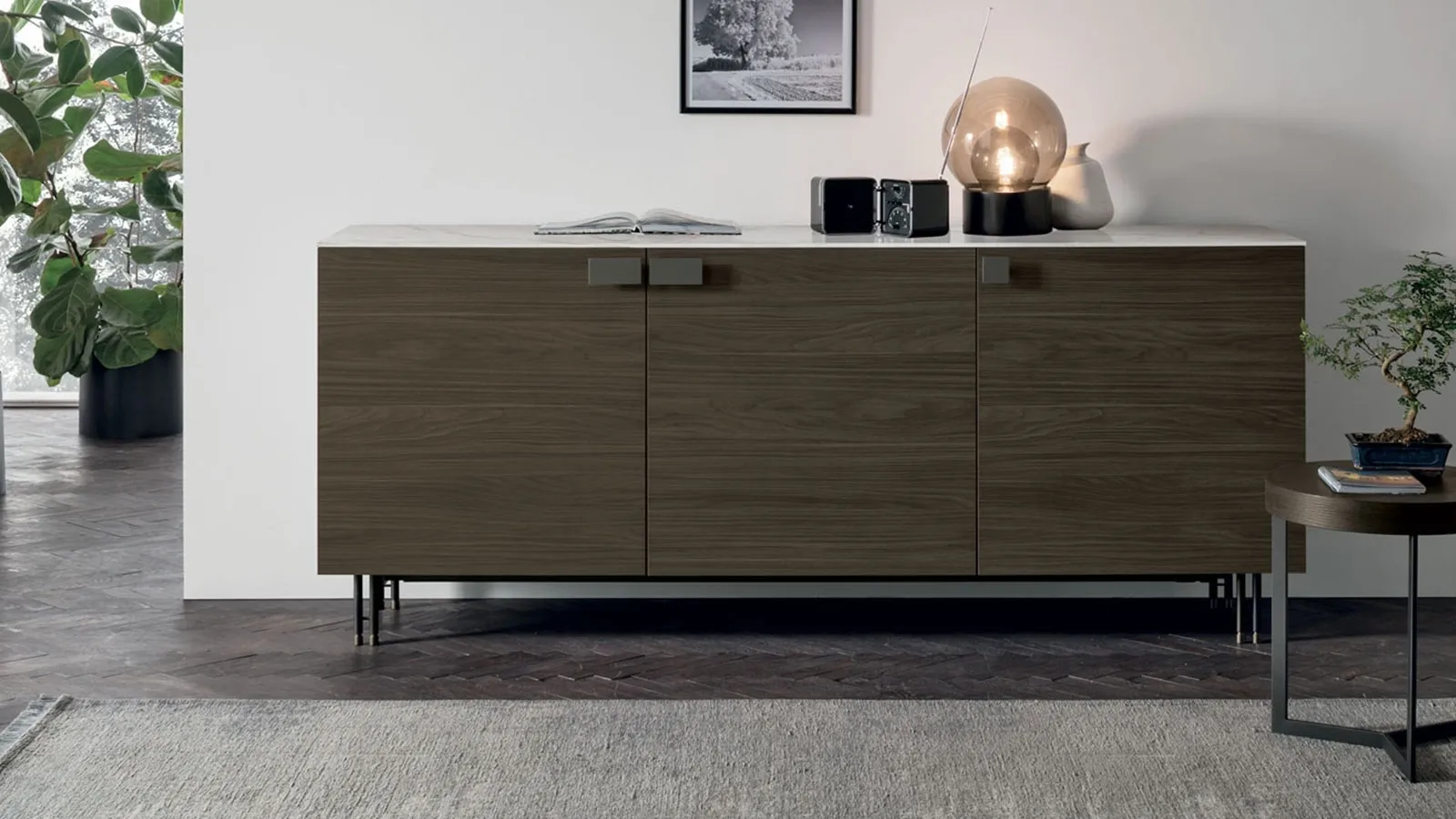 Prometheus sideboard in moka oak and top in Tomasella stoneware.