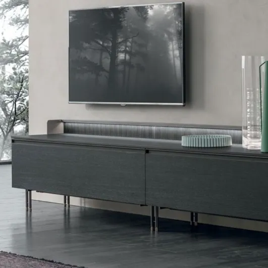 Tomasella's Scenario media cabinet in textured charcoal oak with a base in anthracite metal and brass.