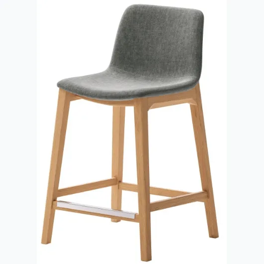 Alessia stool in fabric with ash wood structure by Veneta Cucine.