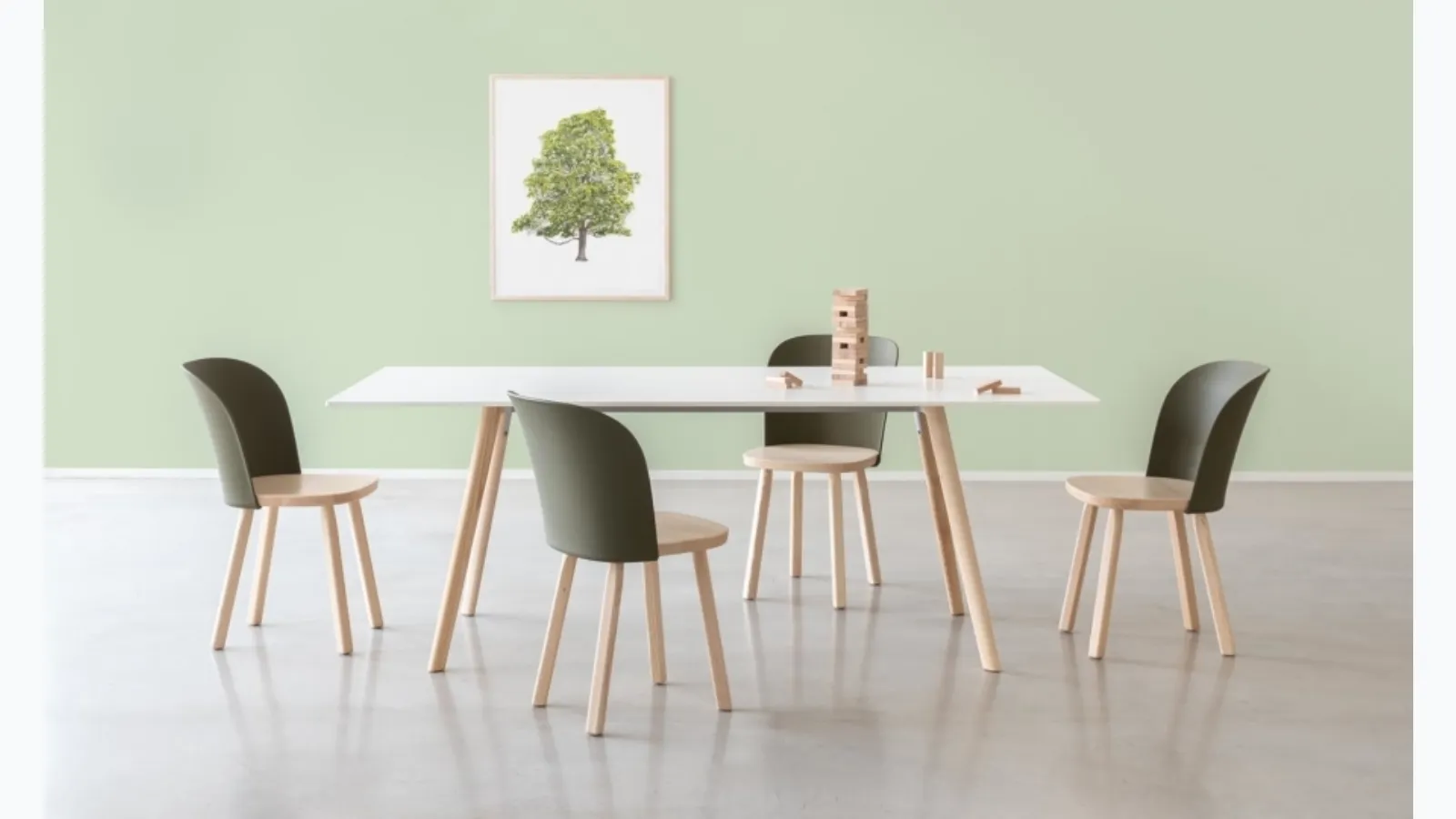 Chair with seat and legs in solid ash wood, backrest in Alpina polypropylene by Magis.