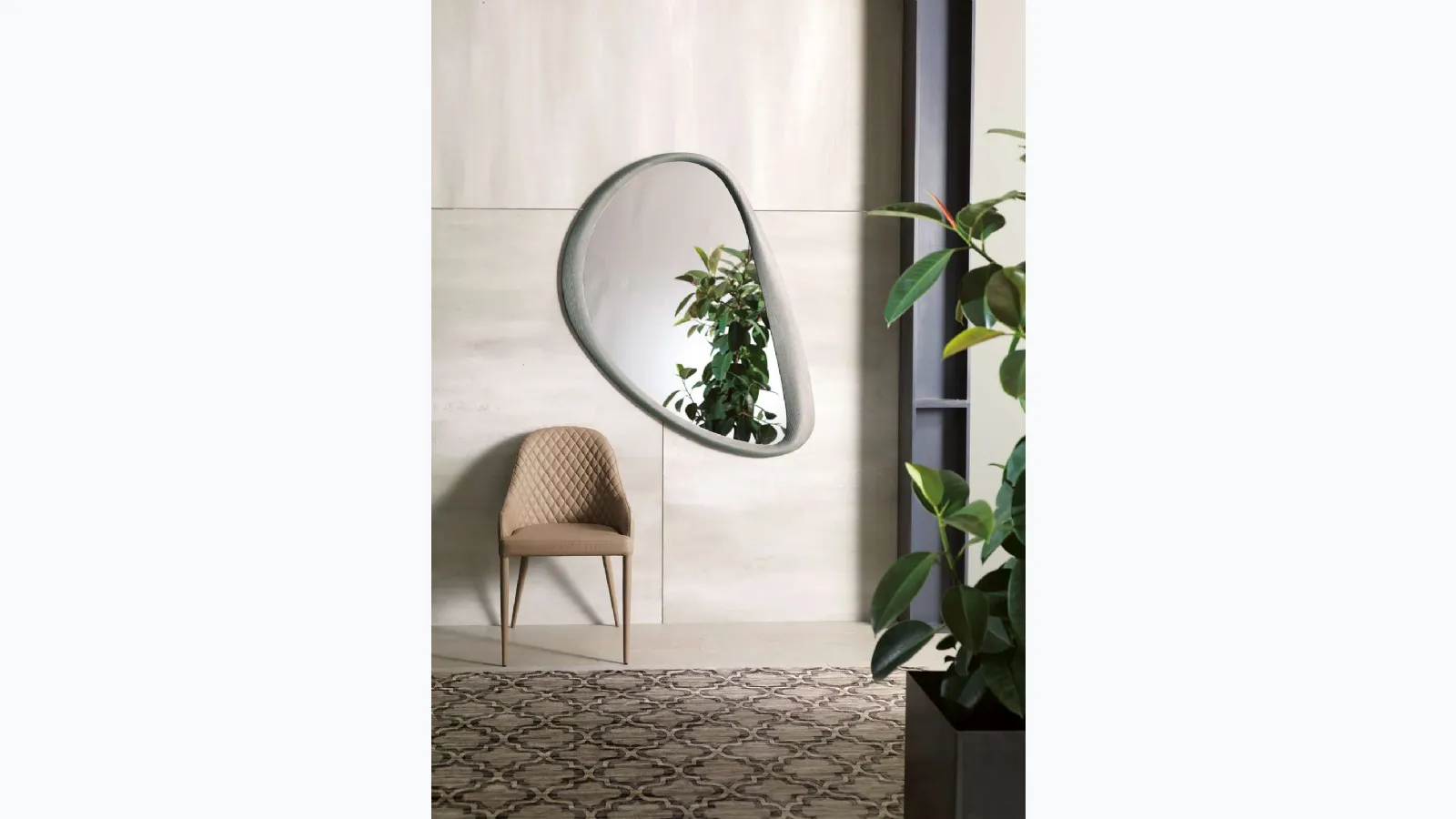 Quilted leather chair Betta by Ozzio.