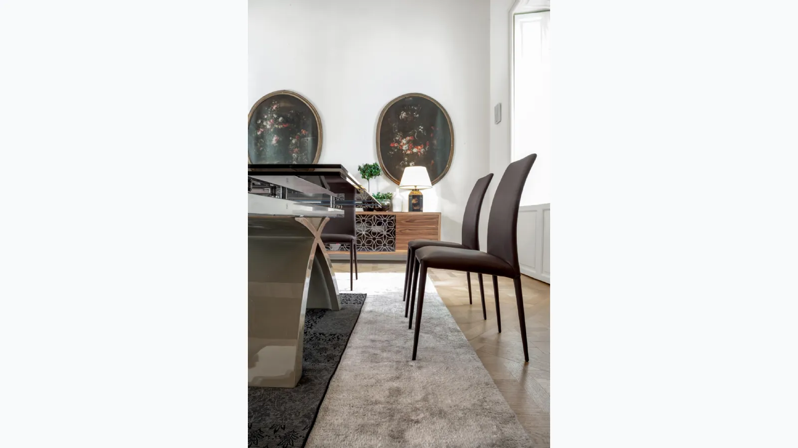 Charm chair completely covered in leather by Tonin Casa.