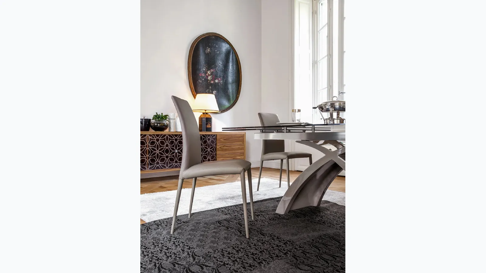 Chair Charm covered in leather by Tonin Casa