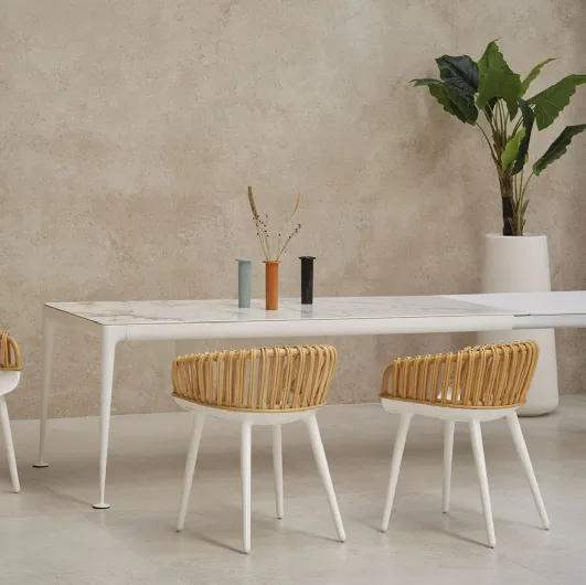 Cyborg Club chair in polycarbonate and wicker by Magis.