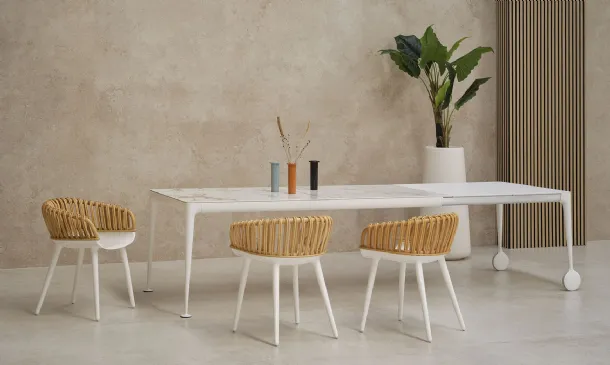 Cyborg Club chair in polycarbonate and wicker by Magis.