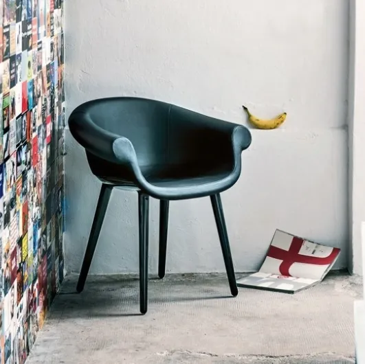 Leather chair with polycarbonate Cyborg Lord frame by Magis.