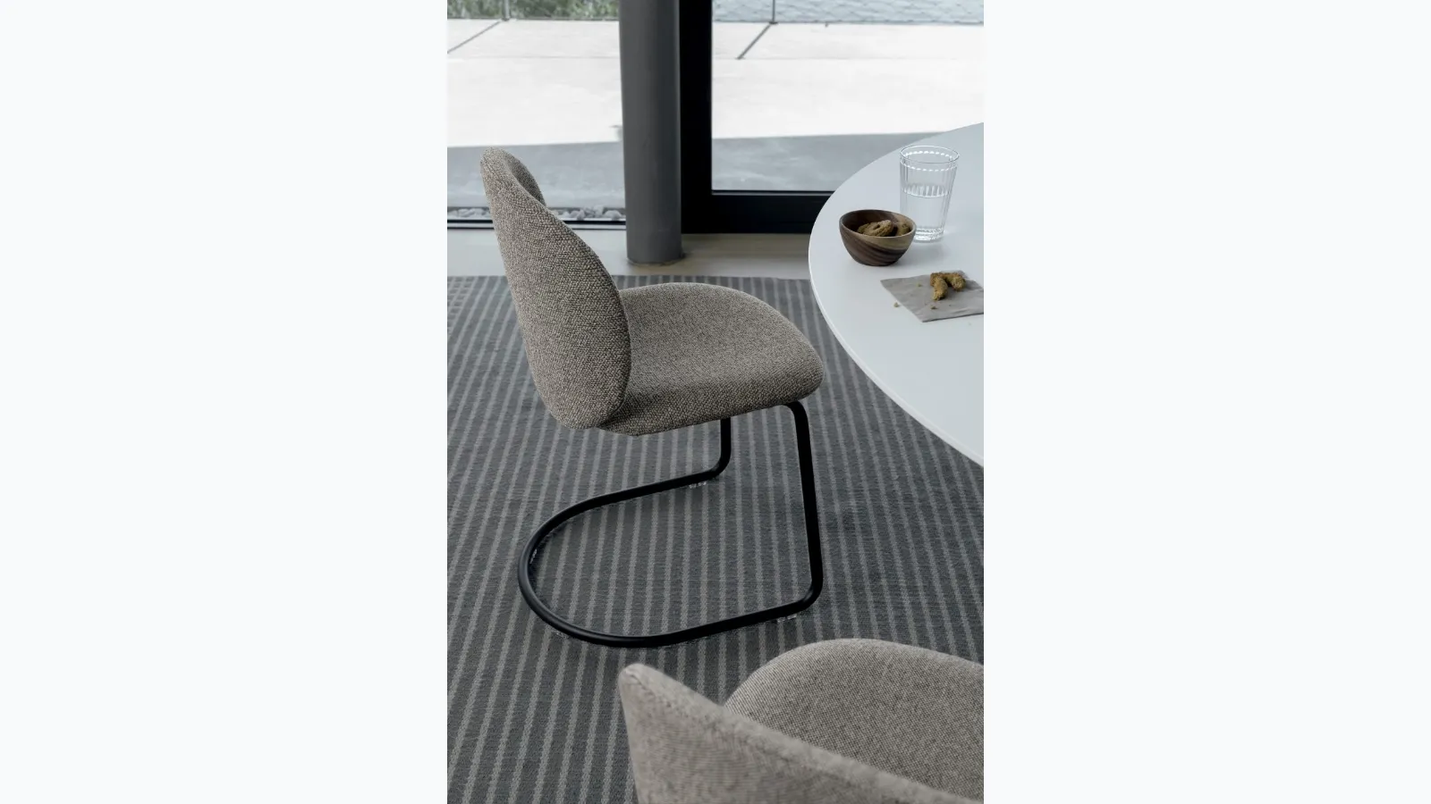 Chair Dua in upholstered fabric by Kristalia