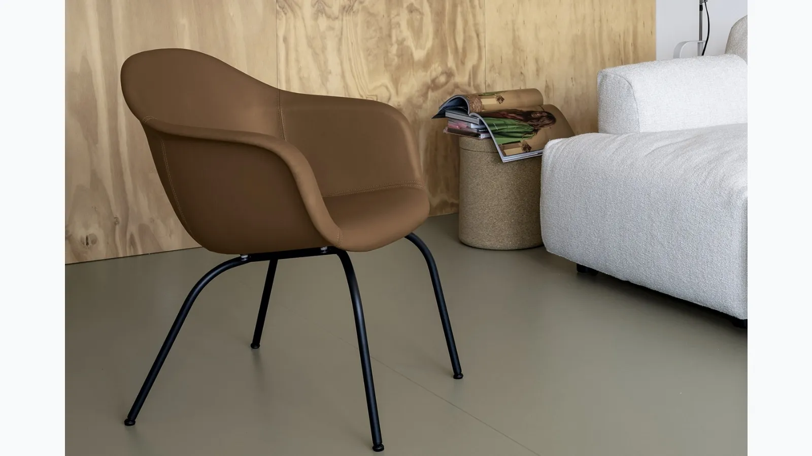 Elephantino Bucket chair upholstered in eco-leather by Kristalia