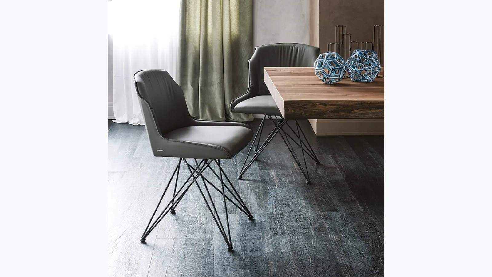 Leather chair with woven steel base Flaminia by Cattelan Italia.