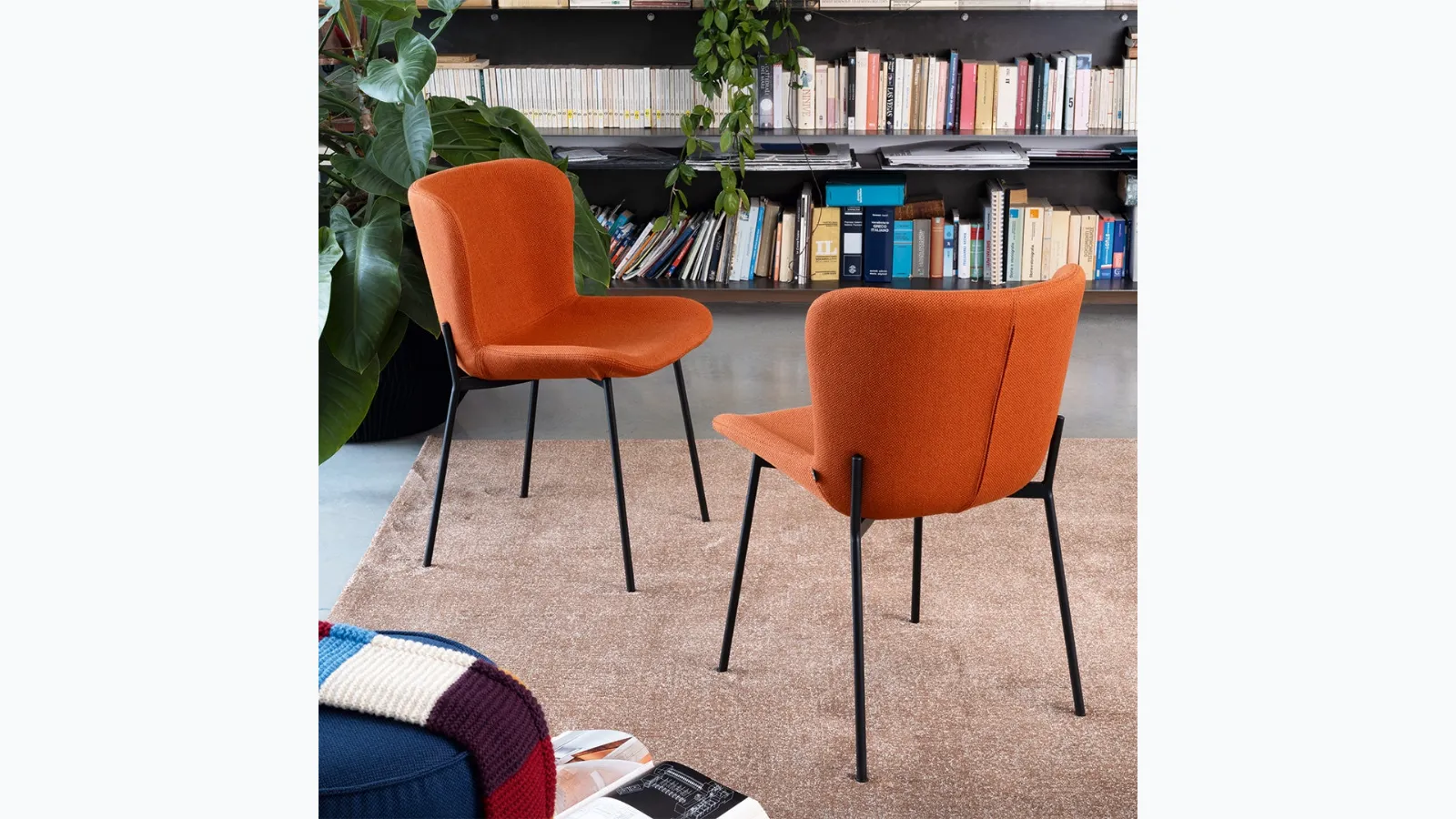 Upholstered chair in Connubia's design