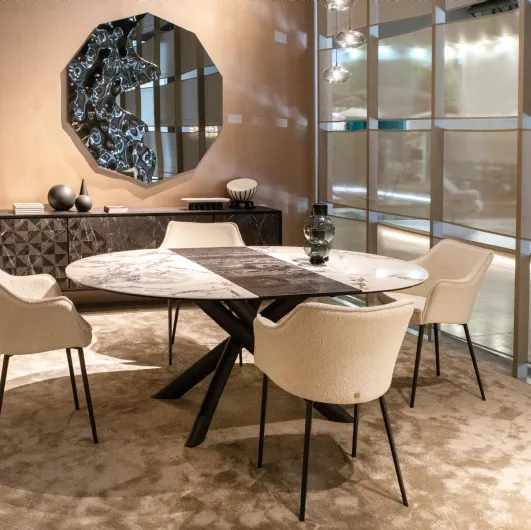Gaia chair with upholstered fabric by Tonin Casa.