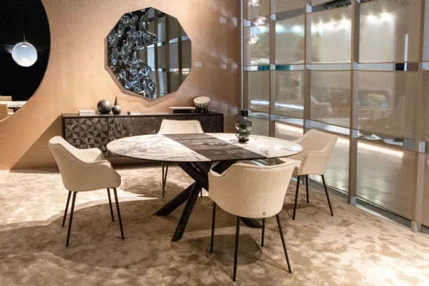 Gaia chair with upholstered fabric by Tonin Casa.