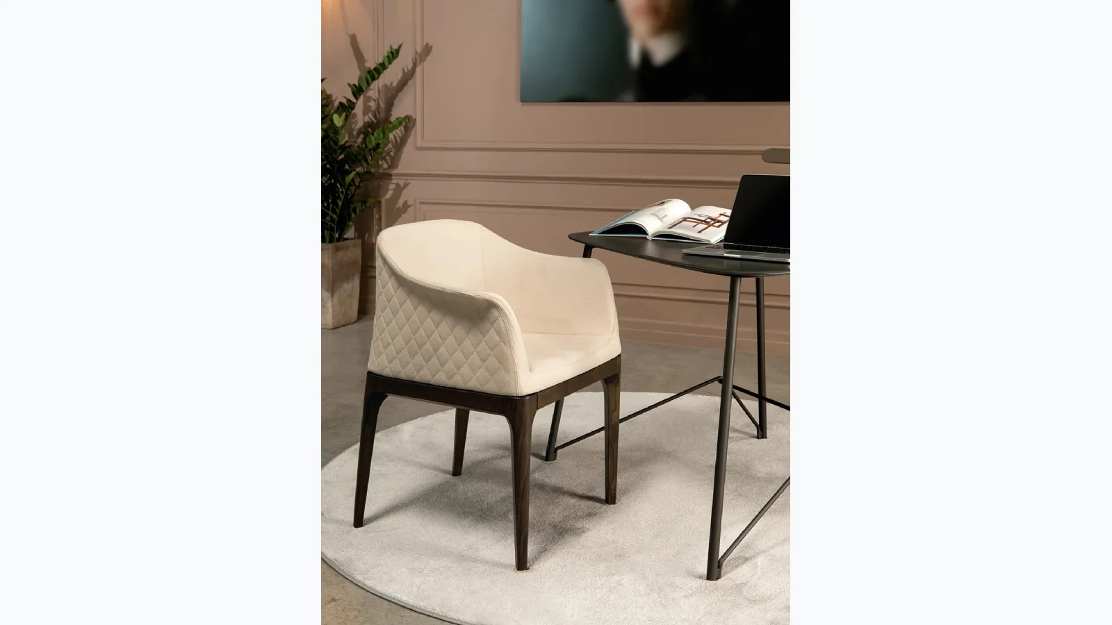 Quilted diamond pattern leather armchair with armrests on the backrest Gilda Elite by Tonin Casa.