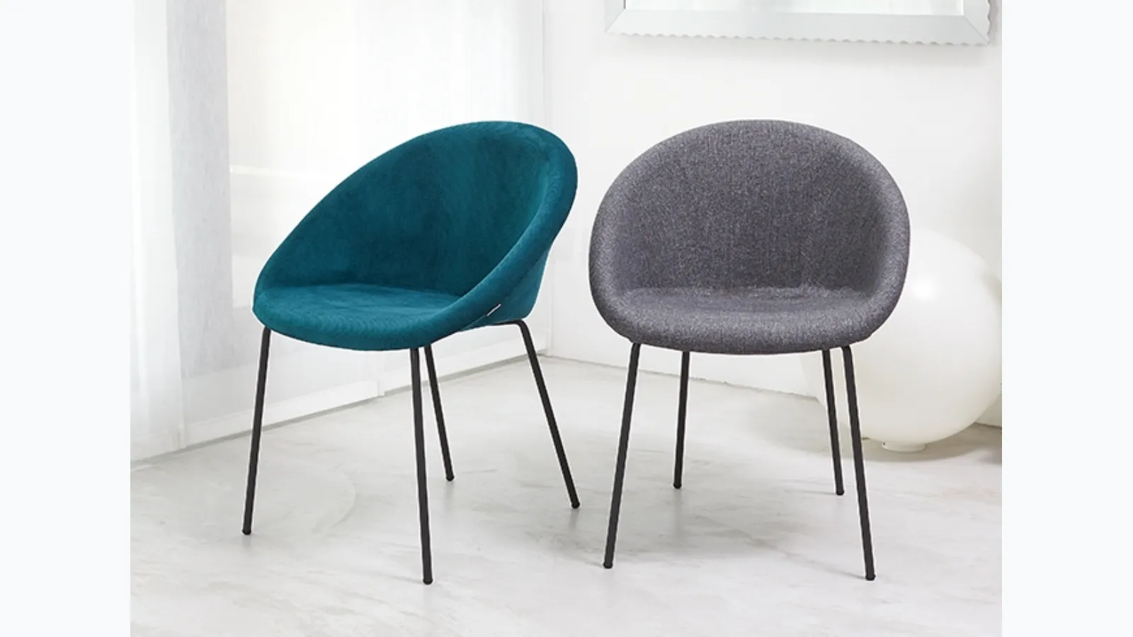 Julia Pop chair with padded fabric seat and tubular steel legs by Scab Design.