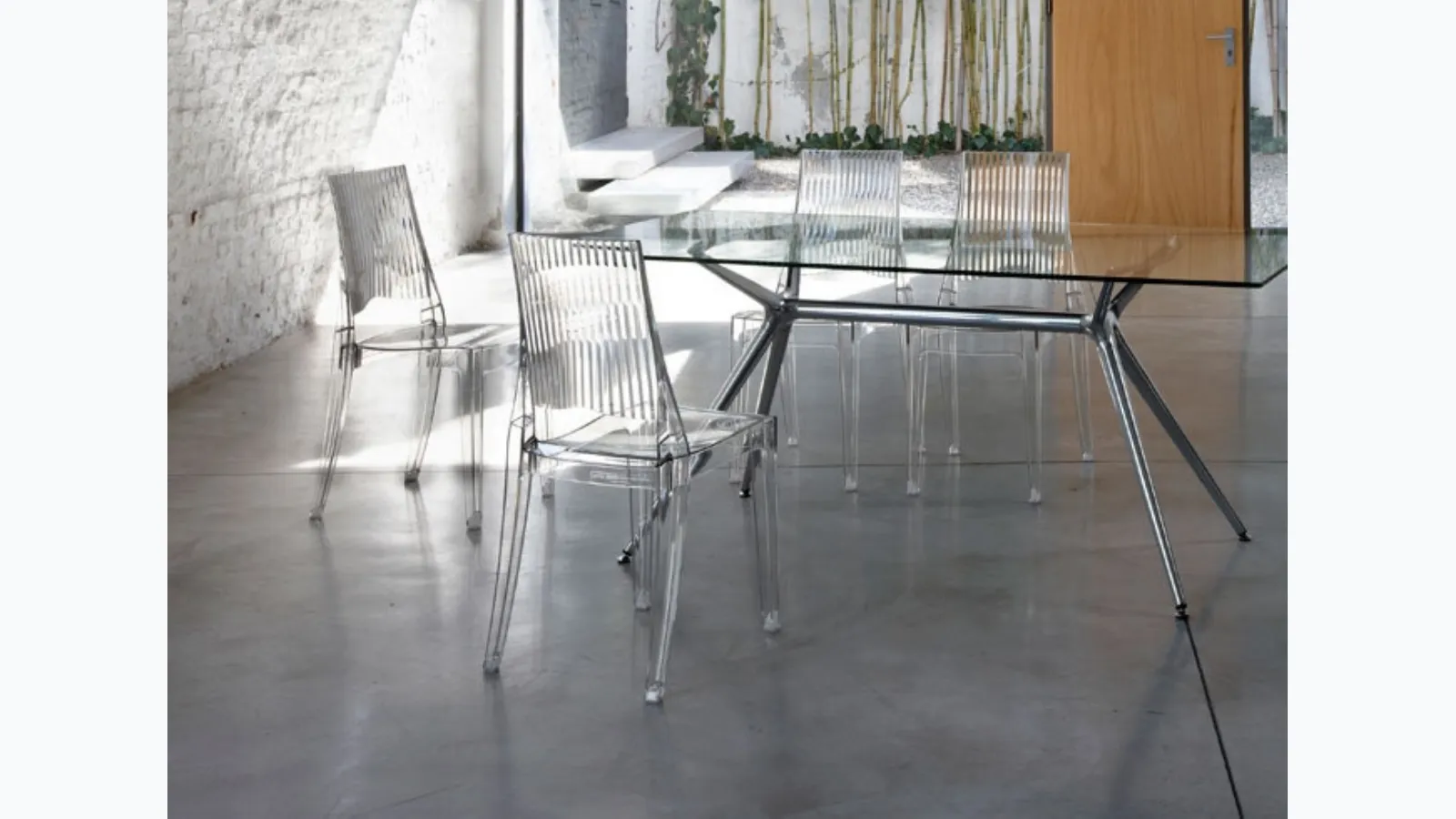 Stackable polycarbonate chair Glenda by Scab Design.
