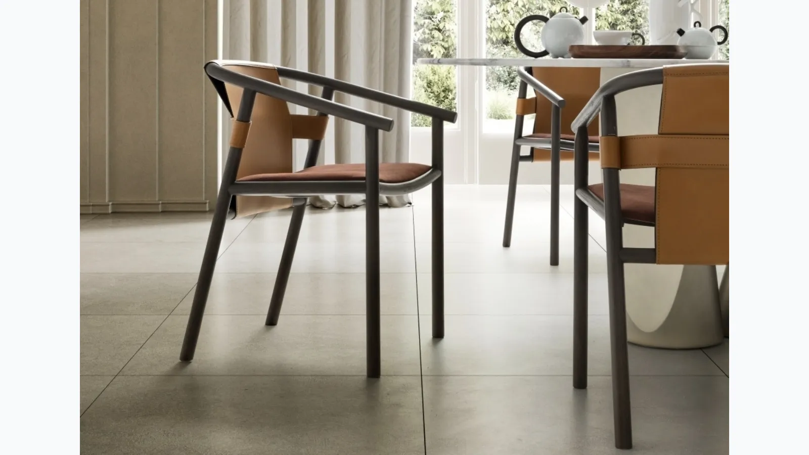 Isa chair in wood and leather by Ditre Italia.