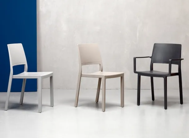 Stackable chair with or without ergonomic and comfortable armrests Kate by Scab Design.
