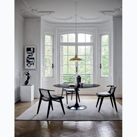The Klismos® Dining Armchair by Knoll.