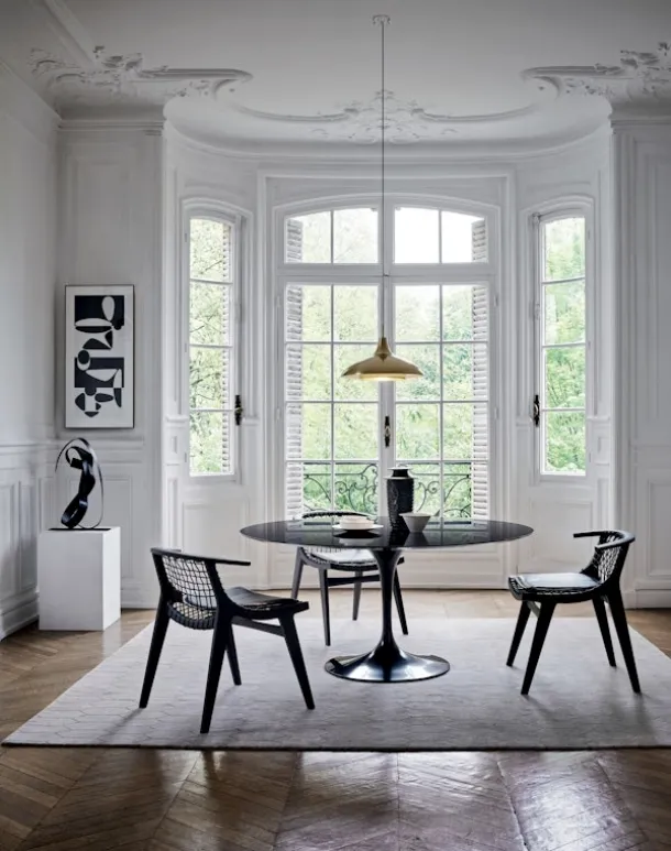 The Klismos® Dining Armchair by Knoll.