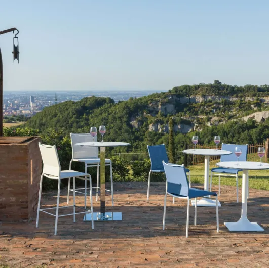 Liù Outdoor chair covered in texplast with a lacquered steel structure for outdoor use by Ingenia.