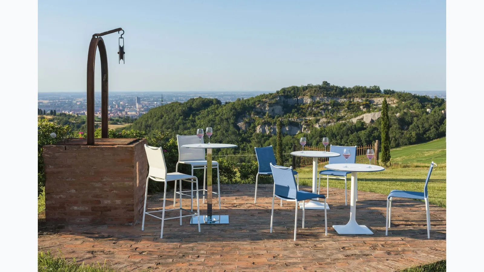 Liù Outdoor chair covered in texplast with a lacquered steel structure for outdoor use by Ingenia.