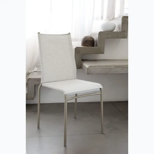 Stackable chair Liù with Texplast covering and lacquered steel structure by Ingenia