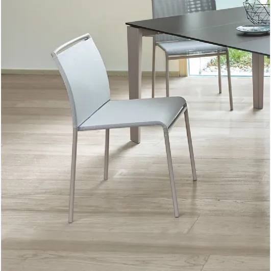 Lola chair upholstered in texplast with a metal frame by Ingenia.