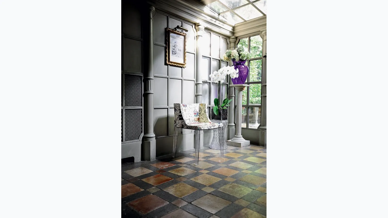 Chair Mademoisella à la Mode in transparent polycarbonate covered in Kartell fabric.