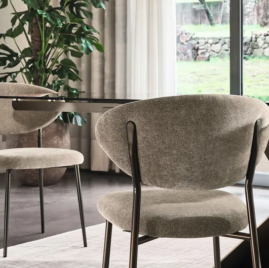 Manta upholstered fabric chair by Calligaris