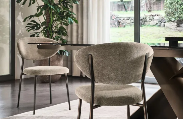 Manta upholstered fabric chair by Calligaris