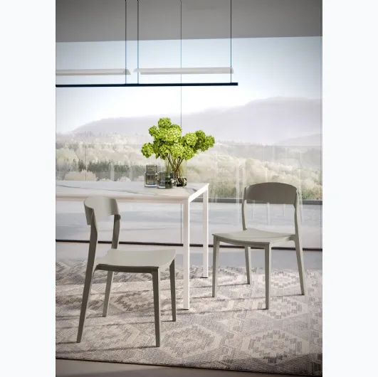 Stackable chair with integral polypropylene structure Mira by Ingenia