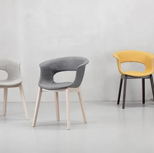 Chair Miss B with fabric seat and solid beech structure by Scab Design.