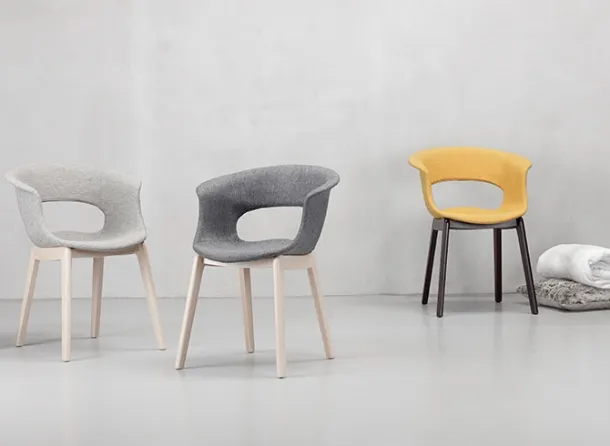 Chair Miss B with fabric seat and solid beech structure by Scab Design.