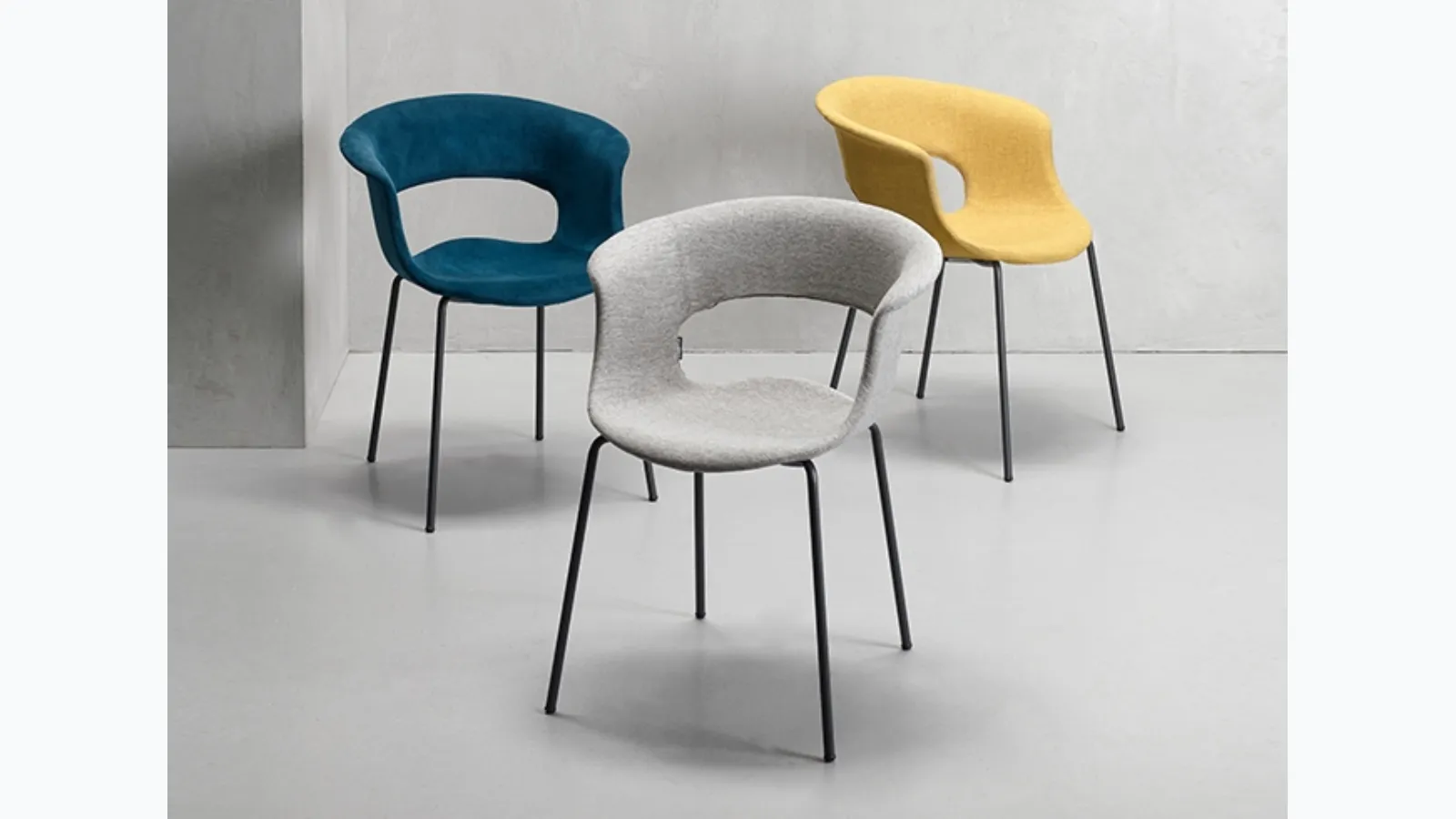Chair Miss B with fabric shell and steel rod structure by Scab Design.