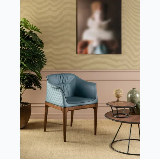 Mivida leather chair with diamond quilted backrest and Elite wood structure by Tonin Casa