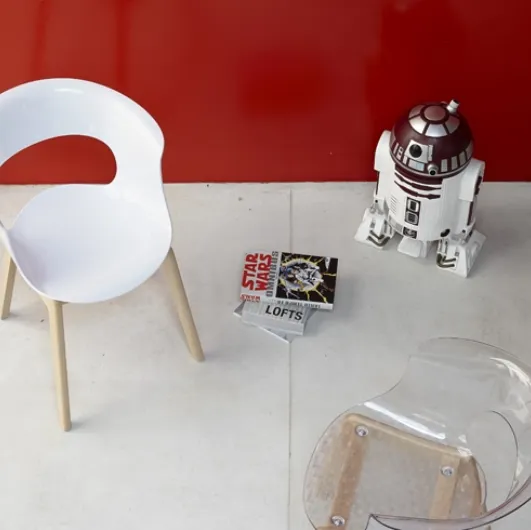 Natural Miss B Antishock chair with white polycarbonate shell and natural beech frame by Scab Design.