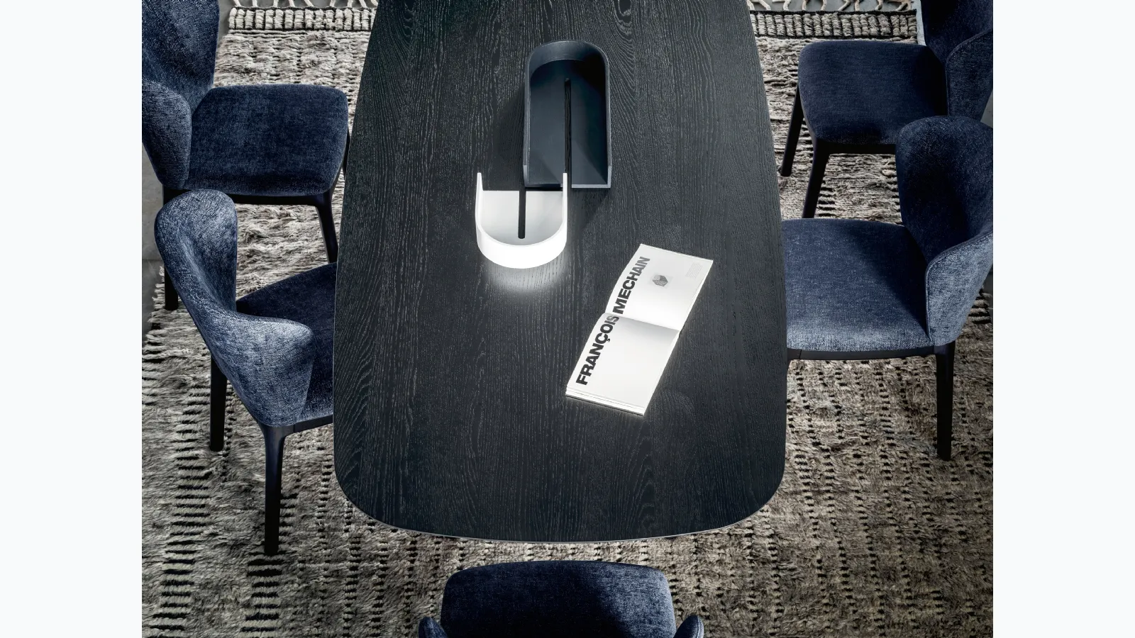 Navy chair with wrap-around backrest and upholstered fabric seat by Novamobili.
