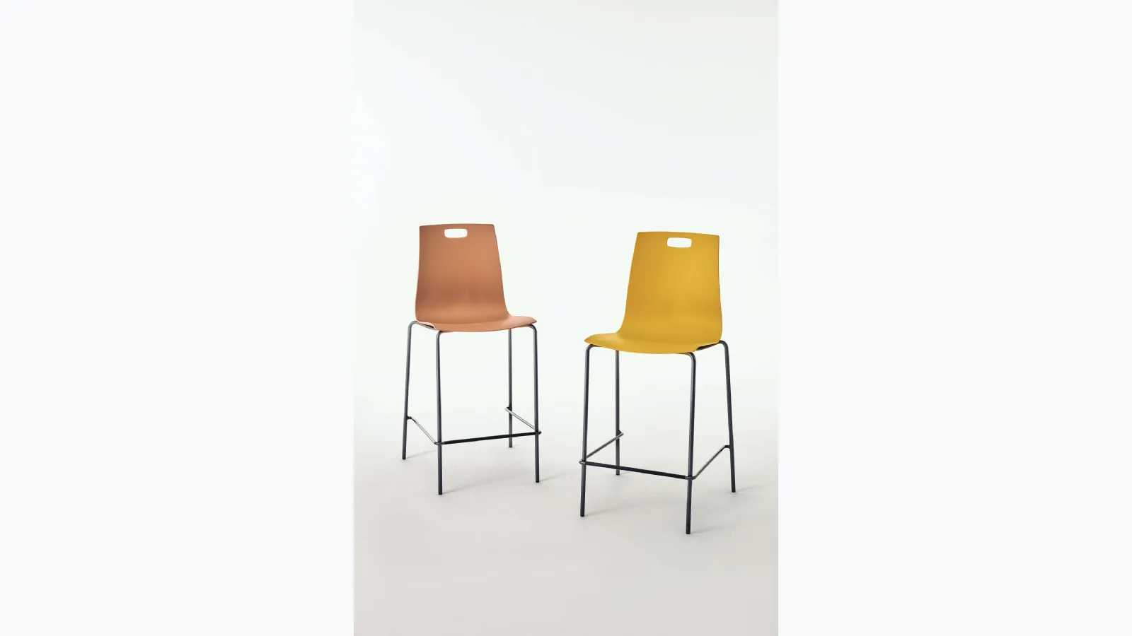 Olly stool with polypropylene seat and lacquered steel structure by Ingenia.