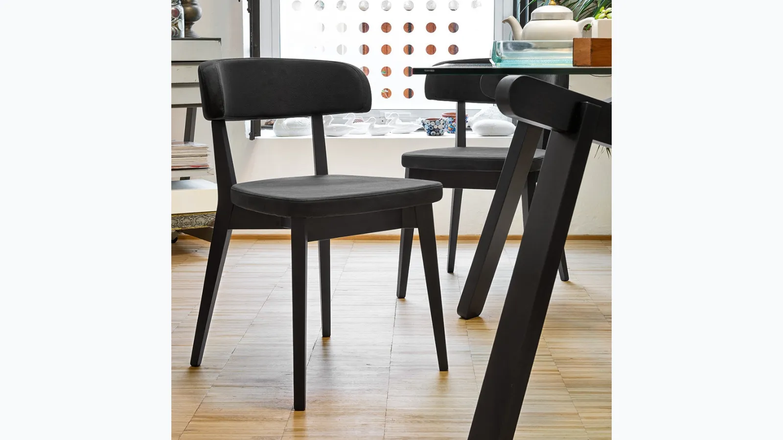 Siren chair in padded fabric by Connubia.